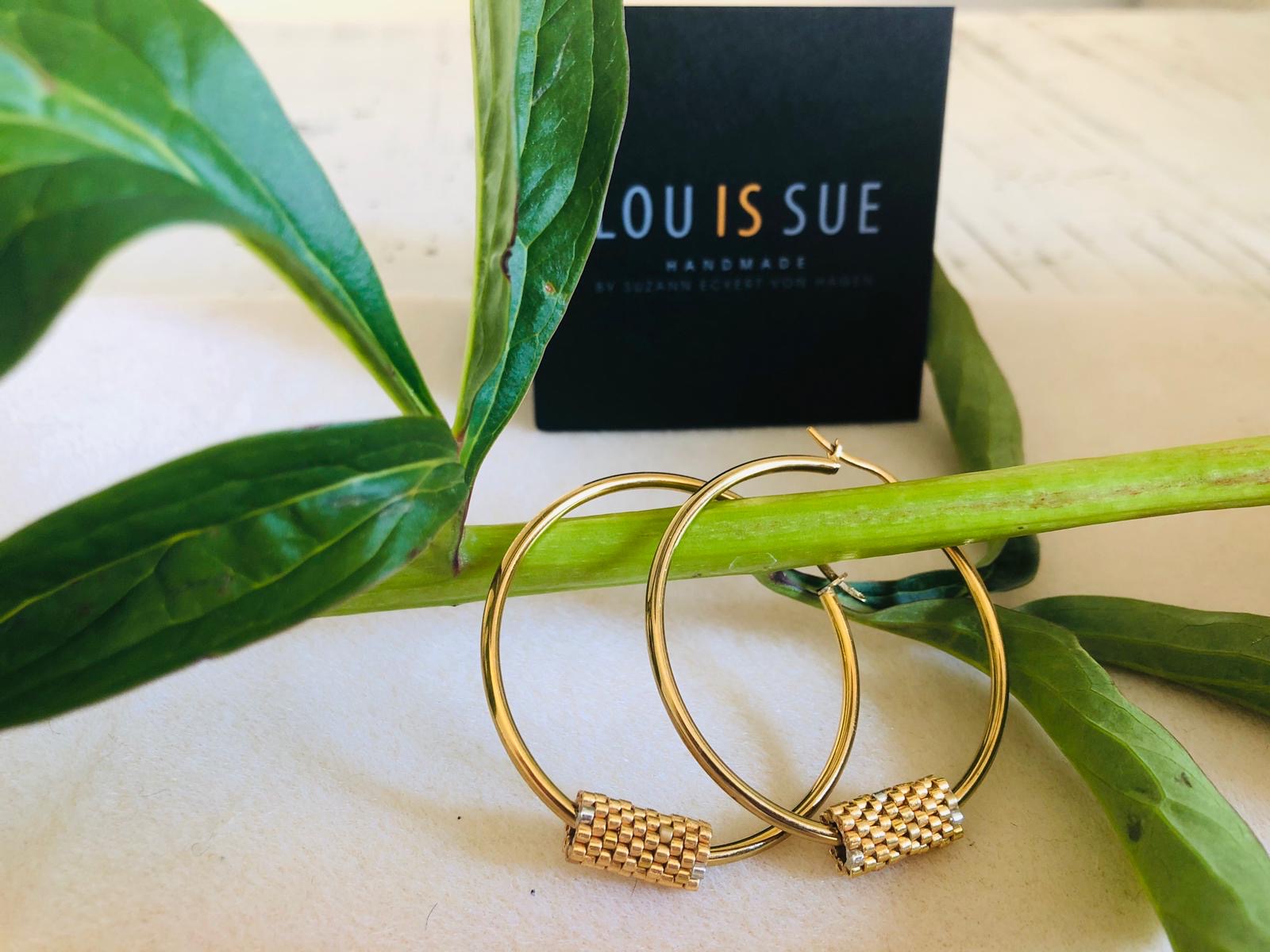 LOU IS SUE